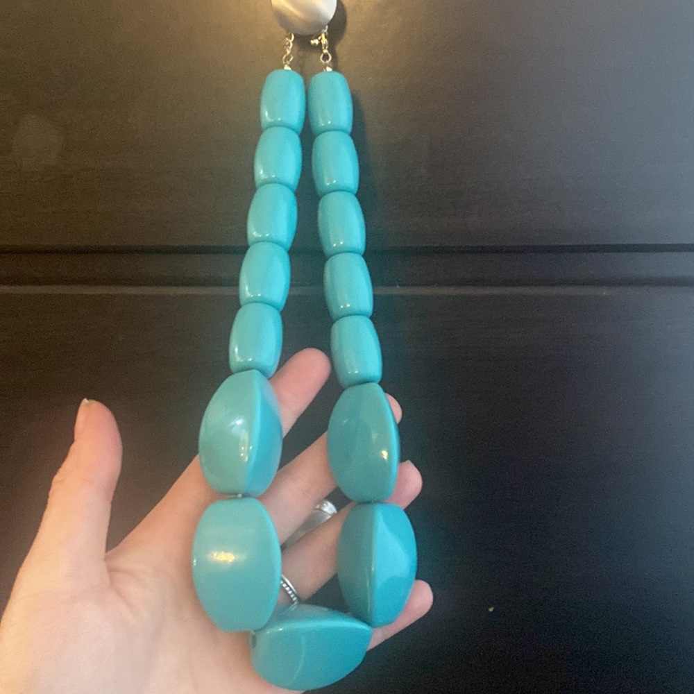 Chunky Blue Necklace with adjustable clasp at neckline. Fun Accessory piece